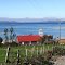 Quelquel,iglesia y cultivo de choritos en el mar.Chiloe.