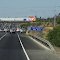 Km.220.-Acceso a Peaje Troncal Rio Claro.-Al Norte
