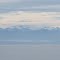 A view of the Andes while entering the Comau Fjord