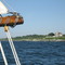 The shore from a sailboat near Newport