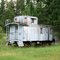 Old Black Hills Central Railroad Caboose in the woods near Hill City, SD