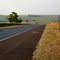 Descida do Córrego Rico - Rodovia Brigadeiro Faria Lima - SP-326 Km-333, ao fundo no horizonte a cidade de Jaboticabal