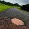 condições da estrada na estação chuvosa / pothole