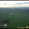 Usina São Francisco ao fundo, em vista aérea.