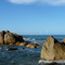 pedras com Recife no horizonte / ezamprogno