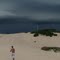 As dunas de Praia dos Ingleses, à direita a Praia e no céu está chegando apenas um temporal, na Ilha de Florianópolis - Santa Catarina - Brasil