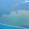 Sissano Lagoon, with Bismark Sea in the Pacific Ocean below, &  Arop Village  in Serai area in West Sepik Province of PNG, Photo by Paul Barker on 12-05-2013