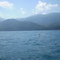 Voo de Passaro Rente à Agua com Bahia de Castelhanos ao Fundo - Ilhabela - Brasil
