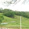 Vista Rural com Lago de Pesca
