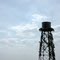 Decorated Veteran - Water Tower in Field