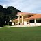Front entry of Club house with 19th hole patio