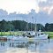 VIRGINIA: RESCUE: Rescue Yacht Basin view: workboats across Jones Creek at dusk