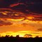 Por do sol junto a uma propriedade particular em Itaporã - Mato Grosso do Sul - Brasil