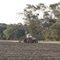 Trator puxa o canhão de irrigação da Usina de Álcool da Cosan em Caarapó - Mato Grosso do Sul - Brasil