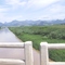 Rio Macaé, sob a Estrada BR-101, com vista da Estação de CEDAE, na margem esquerda e ao fundo as serras Macaenses.