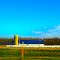 White Barn with Blue Roof