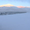 Crossing the bridge on the frozen river