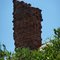 phenomnally weathered ancient-looking brick chimney atop an abandoned and crumbling, wisteria-clad old store building along the highway in Macon, NC, 8-10-11