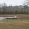 Scarecrow over lake  in Austin, AR - near Highway 5 and Herrera ranch house