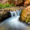 kannara creek water falling over log