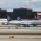 Air New Zealand 777-300ER (landing) and Polar 747-400Fs - view from Terminal 8 - Los Angeles Int´l. Airport (LAX), CA, USA.
