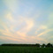 Swirling Cirrostratus Clouds in a June Sunset
