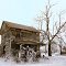 Old house at the crossroads, done in the manner of a Blue Sky postcard of the 1920s