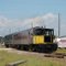 Inland Lakes Railway Tourist Train the "Mount Dora Champion", with GE 45 Ton, Center Cab, Locomotive No. 101 "Herbie" in the lead, at Tavares, FL