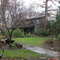 old farmhouse tucked away in a lush, colorful early spring woodland at Pine Knot Farms, 2-28-09