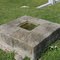 The grave of Timothy Clark Smith, equipped with a window.