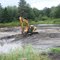 Today they were doing some house keeping, taking out some of the muck and silt that the river continually brings down.