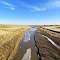 Looking downstream (north-north-easterly) at the South Fork Powder River, from the Powder River Rd. (Old U.S. Hwy. 85) bridge. Kaycee, Wyoming