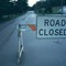Road Closure on SR 503, at Chelatchie Prairie Store.  May 1980.  Gray volcanic ash covers the road surface.