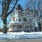 Beautiful Winter Day of a Victorian House in Waupun WI.