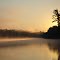 Long Lake, Sunrise Piercing the Lake Mist