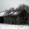Snow on an old barn