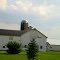 White Barn with a Silo