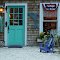 Blue chair, green door