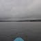 the hot temperature of the lake causes big balls of mist to rise from mount storm lake