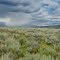 Clouds over distant Union Pass from near the base of Bacon Ridge