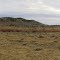 Panorama shot looking easterly to south-south-easterly from off the side of Dry Creek Rd. (Natrona Co. Rd. 212), at the JE Ranch. Cyclone Ridge to the left and Rattlesnake Hills to right. Casper, Wyoming