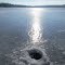 A fishing hole on frozen Bankson Lake