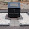 "Lest we forget": black stone monument