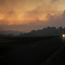 Traffic on Bridport Rd, with Smoke Pall from Forestry Burnoff, Jetsonville