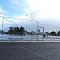 Floodlit courts after rain