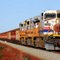 Rio Tinto iron ore train about to cross the Great Northern Highway. See the video at http://www.youtube.com/watch?v=MwoUcEU6pe0