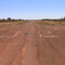 Looking down the historic runway 32 at Daly Waters Aerodrome.