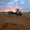 Sunset over car wreck