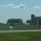 Silo and a sign