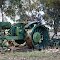 Labours done: historic steel-wheeled tractor and cultivator